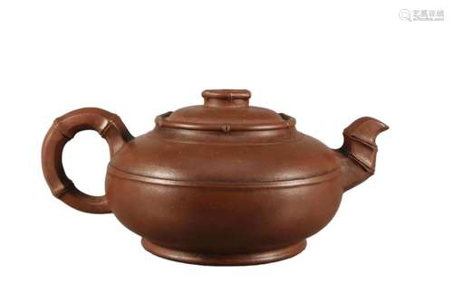 A Fine Yixing Clay Ewer