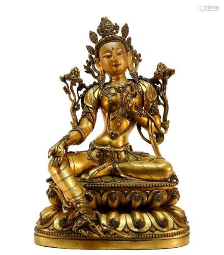 An exquisit gilt bronze Green Tara statue