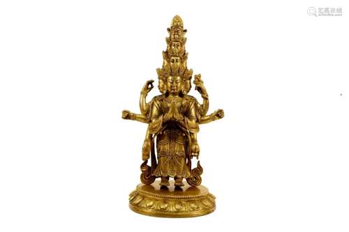 A Gilt-Bronze Figure Of Guanyin With Eleven Faces