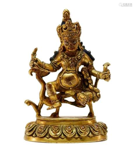 An exquisite gilt bronze Tibetan statue