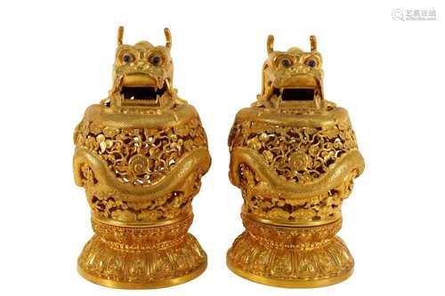 A Pair Of Gilt-Silver Dragon Candlesticks