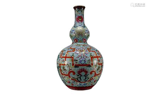 A Famille-Rose Green-Ground Gourd-Shaped Vase