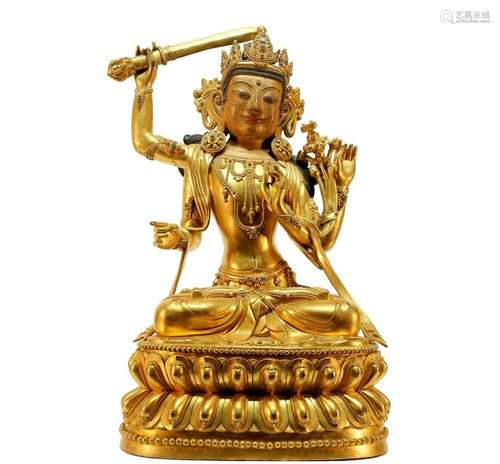 A gorgeous gilt bronze Manjusri statue