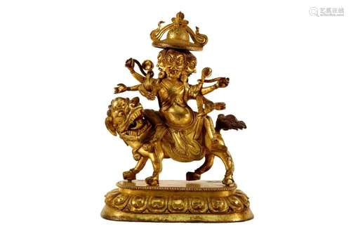 A Gilt-Bronze Figure of Jambhala Riding A Lion