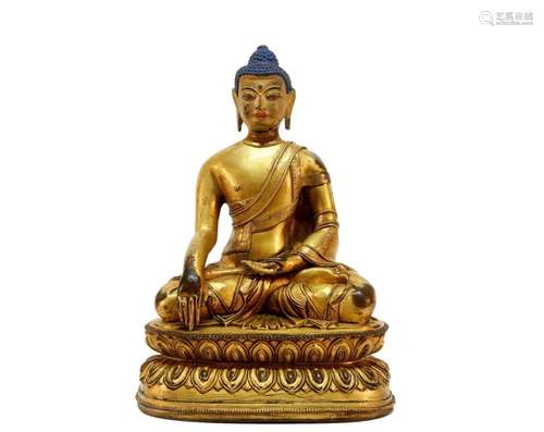 A gilt bronze Sakyamuni statue