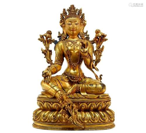 A gilt bronze Green Tara statue