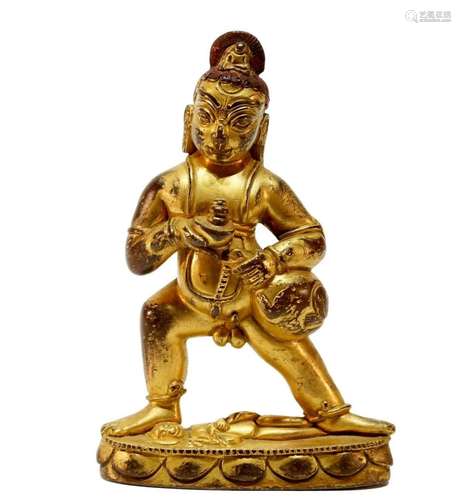 An unique gilt bronze Tibetan statue