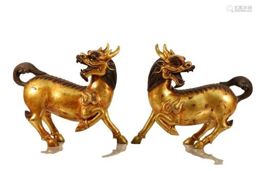 A Pair of Gilt-Bronze Kylin Ornaments