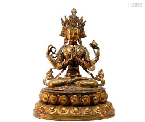 A gilt bronze Four armed Guanyin statue