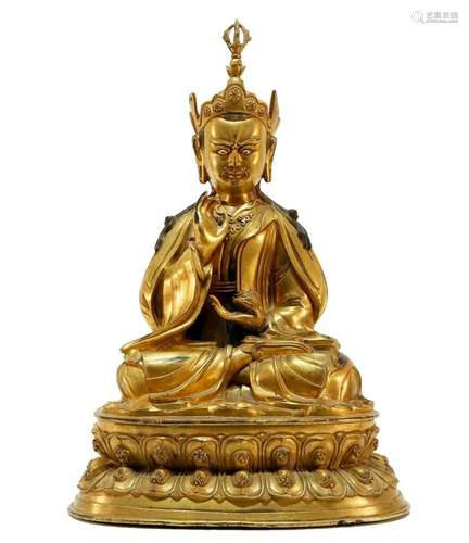 A gilt bronze Guru Rinpoche statue