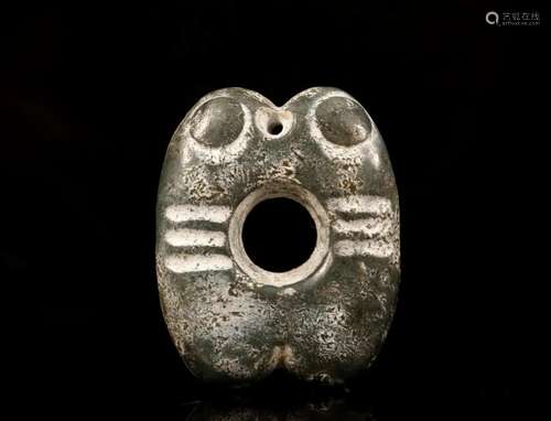 A Hongshan Culture Jade Pendant.