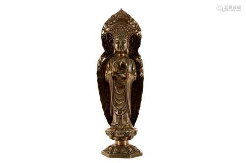 A Silver Standing Figure of Buddha Shakyamuni