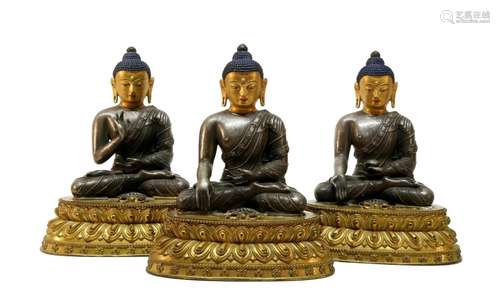 Three rare gilt bronze Tibetan Trekalea statue