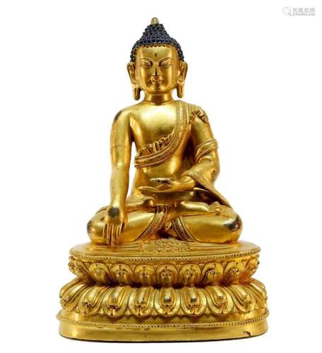 A gilt bronze Sakyamuni statue