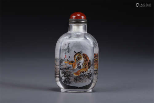 A Glass Snuff Bottle with Inner Tiger Design.