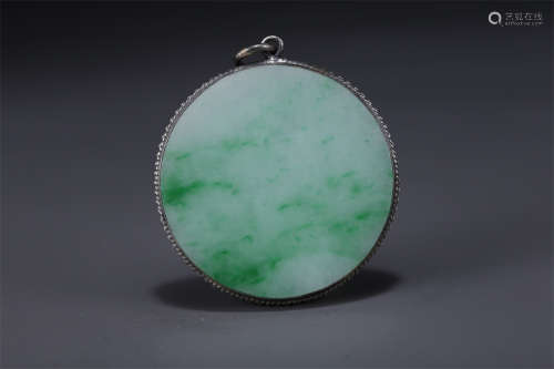 A Silver Bluing Pendant with Jadeite Inlay.