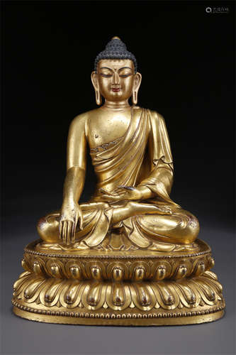 A Gilt Copper Sakyamuni Buddha Statue.