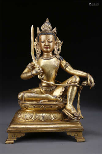 A Gilt Copper Manjusri Bodhisattva Statue.