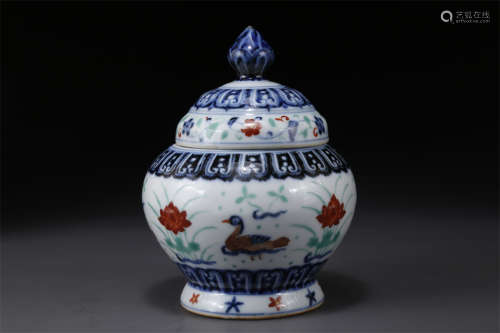 A Porcelain Lidded Jar with Flowers Design.