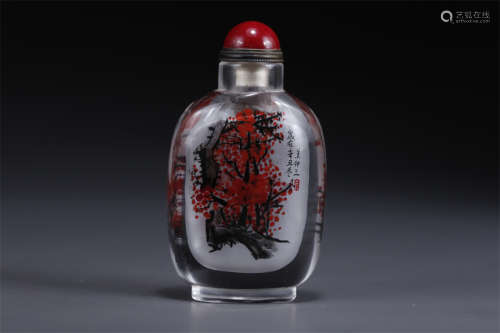 A Glass Snuff Bottle with Flowers Design.