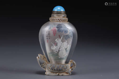 A Glass Snuff Bottle with Rabbit Design.