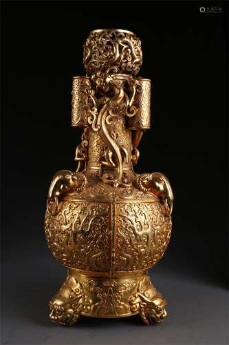 A Gilt Copper Bottle with Pierced Ears.