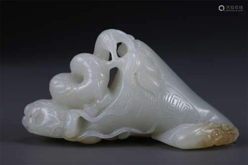 A Hetian Jade Dragon and Phoenix Ornament.