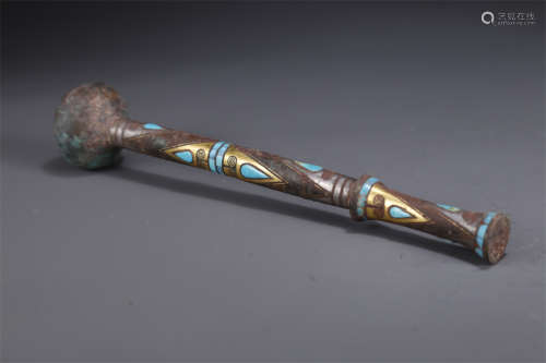 A Bronze Hammer with Gold and Silver Inlay.