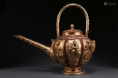 A Gilt Copper Teapot with Handle.