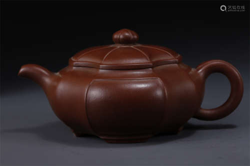 An Eight-Arris Purple Clay Teapot.