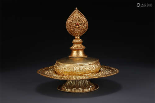 A Gilt Copper Buddhist Plate.