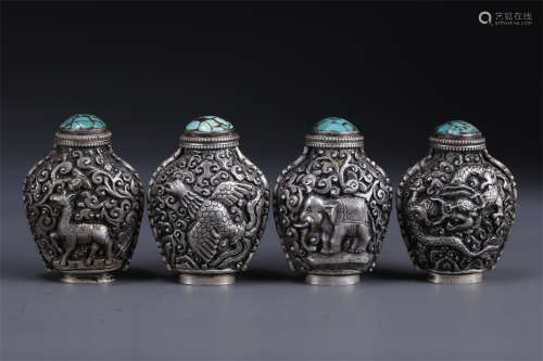 A Set of Silver Snuff Bottles.