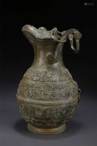 A Bronze Pot with Loop Handle.