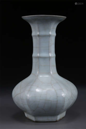 A Celeste Glazed Six-Arris Porcelain Bottle.