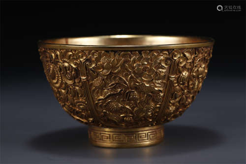 A Gilt Copper Bowl with Flowers Design.