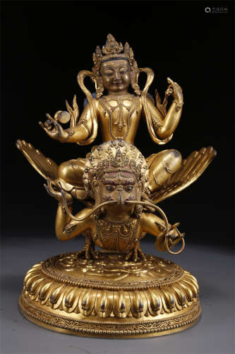 A Gilt Copper Female Buddha Statue.