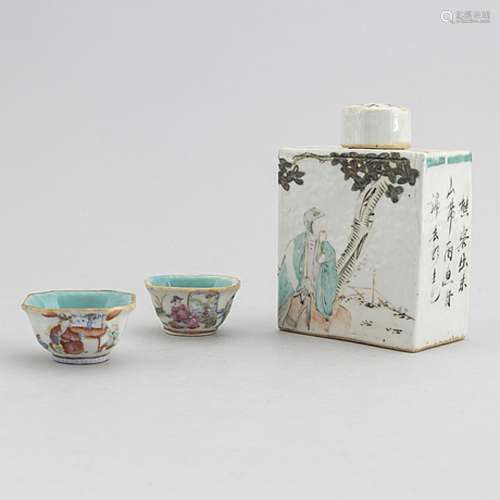 A Chinese porcelain tea caddy and a pair of salt cellars, fi...