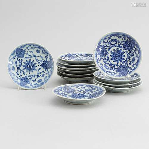 A set of 12 similar Chinese blue and white porcelain small d...