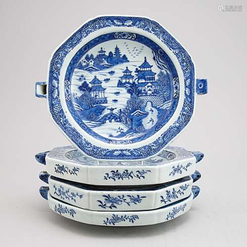 A group of four Chinese blue and white warming plates (2+1+1...