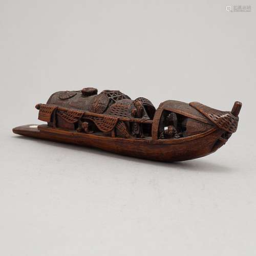 A Chinese bamboo sculpture of a boat, 20th Century.