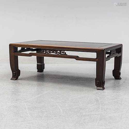 A Chinese hardwood low table, 20th Century.