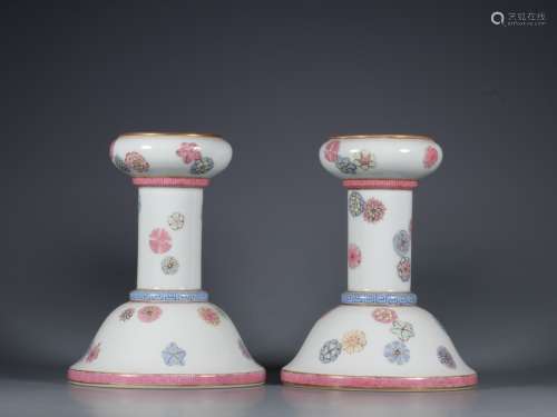A pair of pastel Candlesticks