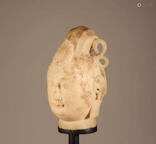 White marble Buddha head