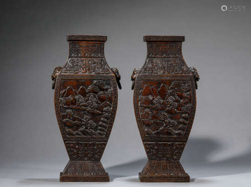 A Pair of Chinese Sandalwood 
Poem and Beast Vases