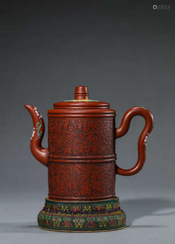 A Chinese Redware Teapot and Cover Marked Kang Xi
