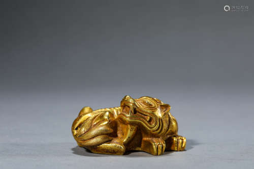 A Chinese Gilt-Bronze Pi Xiu 
Beast Paper Weight