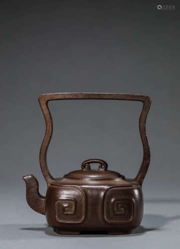 A Chinese Redware Teapot and Cover