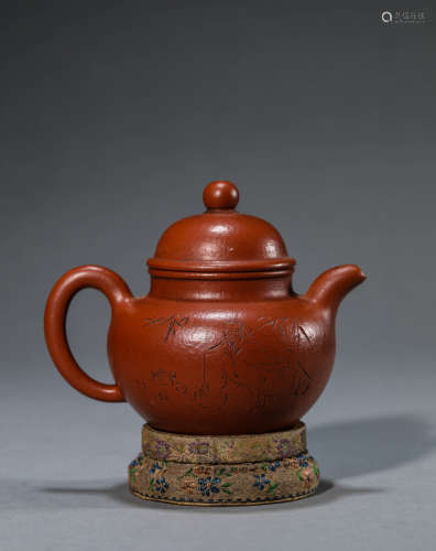 A Chinese Redware Teapot and Cover