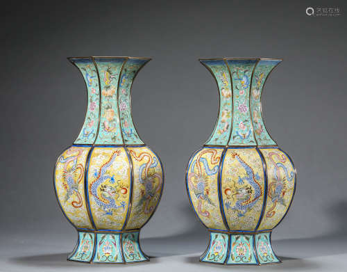 A Chinese Enamel Painted Dragon and Phoenix 
Vase Marked  Qi...