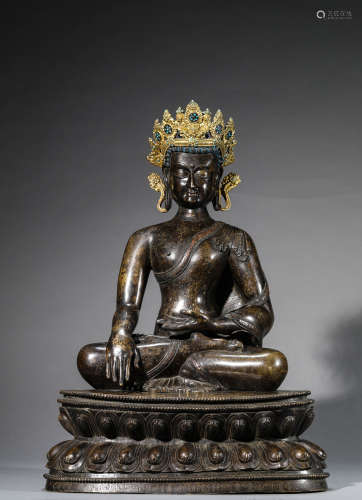 A Chinese Bronze Sakyamuni Statue